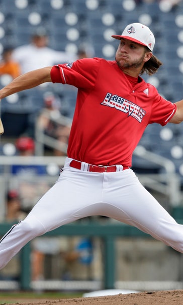 Louisville survives shaky 8th, 9th to beat Auburn 5-3 at CWS